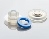 silicone, over-molded, parts on grey background