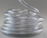clear tygon tubing coil on grey background