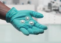 Two-shot molded parts in teal glove